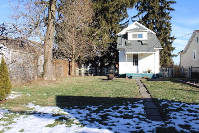 view of yard covered in snow