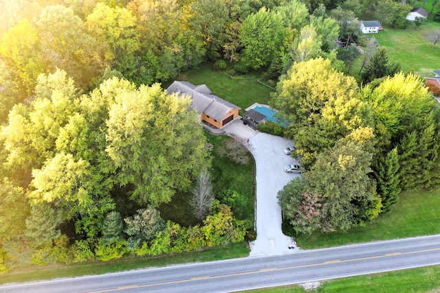 9115 New Bremen New Knoxville Rd, New Knoxville, OH 45871 - aerial view of property and surrounding area featuring a heavily wooded area