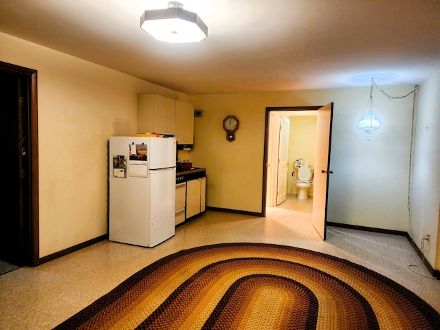 9115 New Bremen New Knoxville Rd, New Knoxville, OH 45871 - kitchen featuring freestanding refrigerator and baseboards