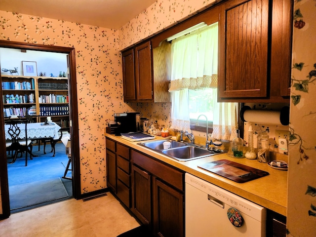 9115 New Bremen New Knoxville Rd, New Knoxville, OH 45871 - kitchen with dishwasher, wallpapered walls, light countertops, and light flooring