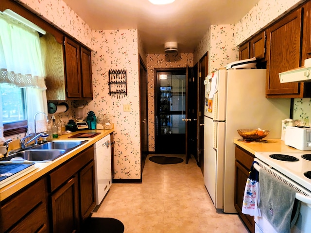 9115 New Bremen New Knoxville Rd, New Knoxville, OH 45871 - kitchen featuring wallpapered walls, white appliances, light countertops, and light floors