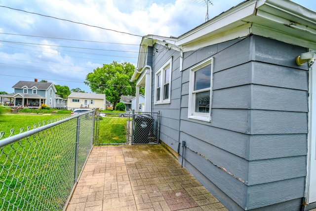 220 Williams St, Troy, OH 45373 - view of side of property with a gate