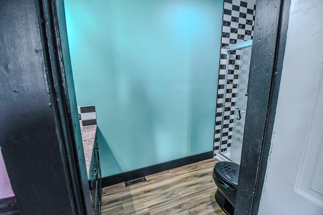 220 Williams St, Troy, OH 45373 - full bathroom featuring a stall shower and wood finished floors