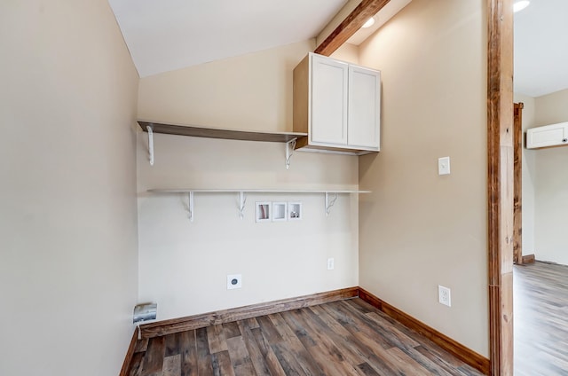 washroom featuring hookup for a washing machine, wood finished floors, baseboards, hookup for an electric dryer, and cabinet space