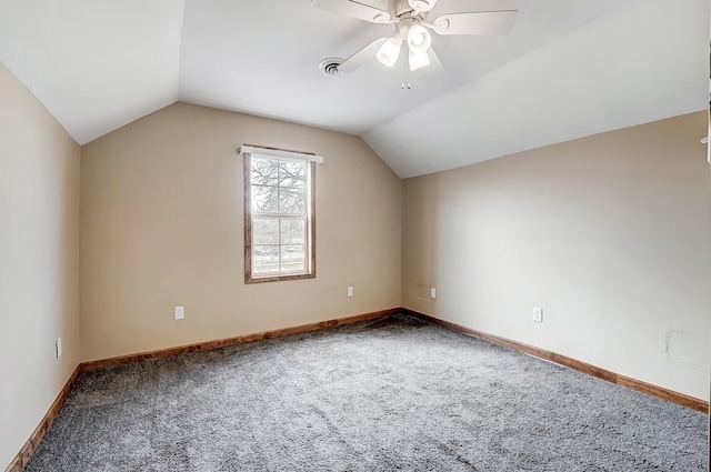 bonus room featuring vaulted ceiling, baseboards, visible vents, and ceiling fan