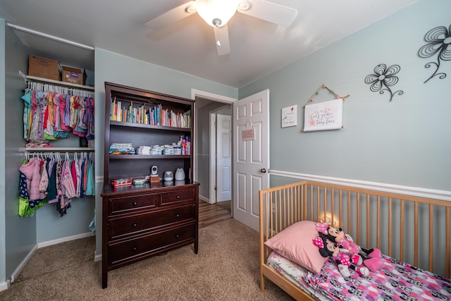 bedroom featuring carpet flooring, a ceiling fan, and baseboards