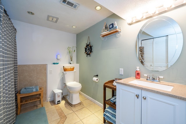 full bathroom with visible vents, toilet, recessed lighting, tile patterned flooring, and vanity