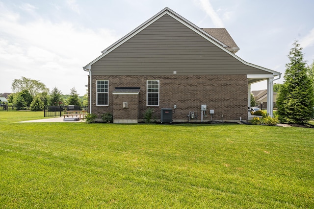8754 Elysee Cir, Washington Twp, OH 45458 - back of property featuring brick siding and a patio area
