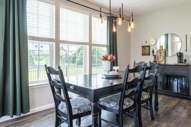 8754 Elysee Cir, Washington Twp, OH 45458 - dining space with dark wood-type flooring and a chandelier