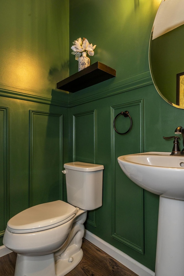 8754 Elysee Cir, Washington Twp, OH 45458 - half bath featuring a decorative wall and wood finished floors