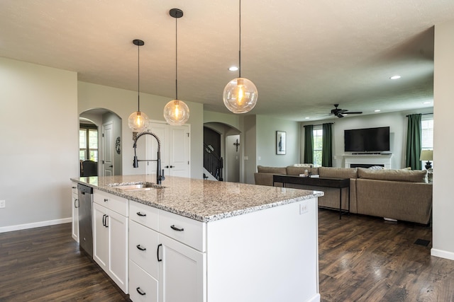 8754 Elysee Cir, Washington Twp, OH 45458 - kitchen with arched walkways, a ceiling fan, dark wood-style floors, and recessed lighting