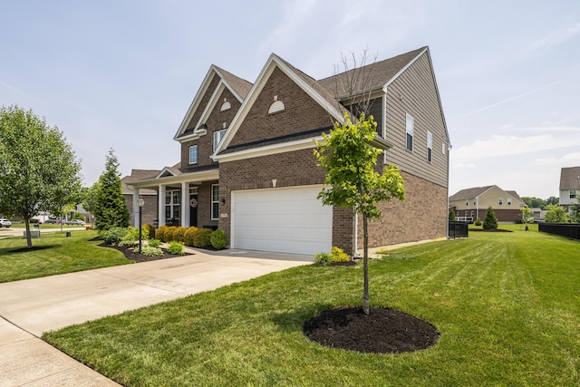 8754 Elysee Cir, Washington Twp, OH 45458 - view of front of house with brick siding, a front lawn, driveway, and a garage