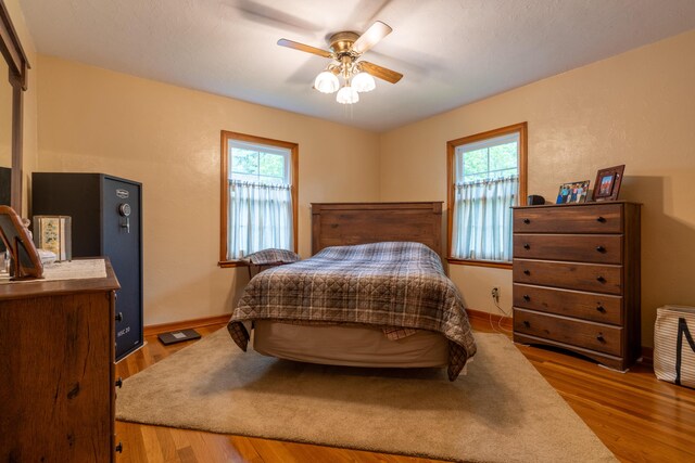 704 Campbell Rd, Sidney, OH 45365 - bedroom featuring ceiling fan, baseboards, and wood finished floors