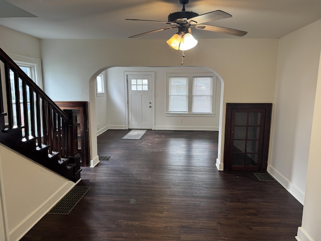 entryway featuring ceiling fan and dark hardwood / wood-style flooring