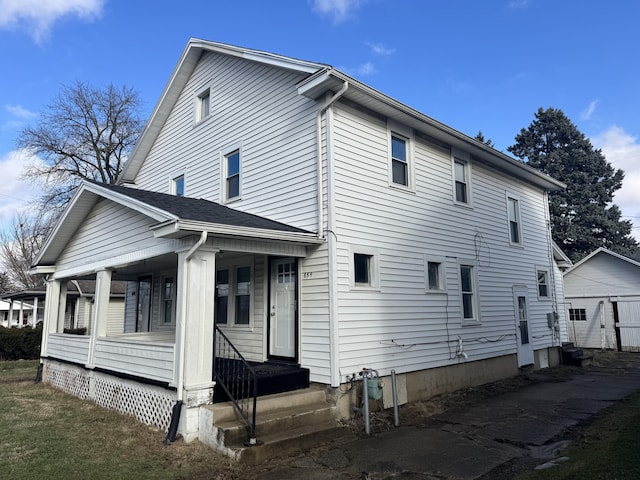 view of home's exterior featuring covered porch