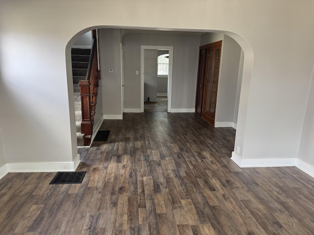 interior space with dark hardwood / wood-style floors