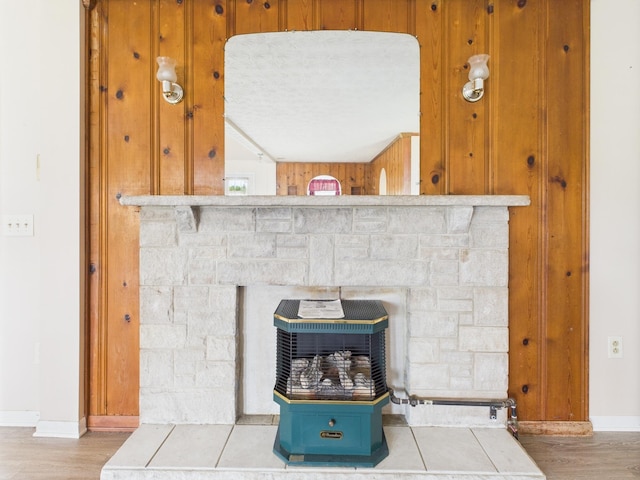 173 Front St, West Milton, OH 45383 - detailed view of a stone fireplace and wood finished floors