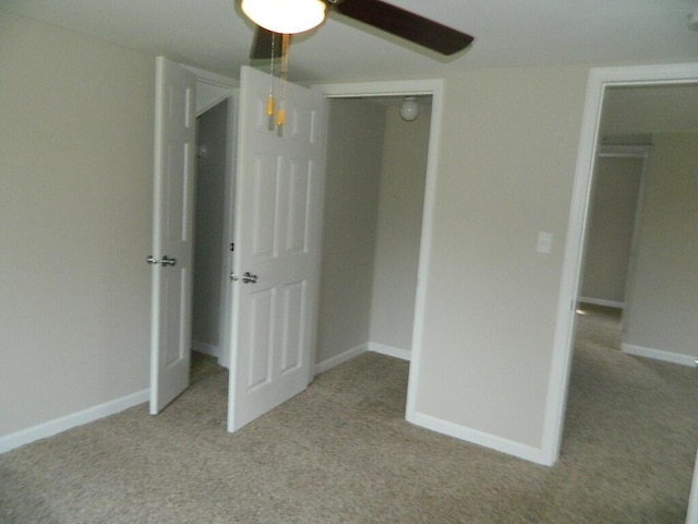 16 E Walnut St, Jeffersonville, OH 43128 - unfurnished bedroom with carpet, ceiling fan, and baseboards