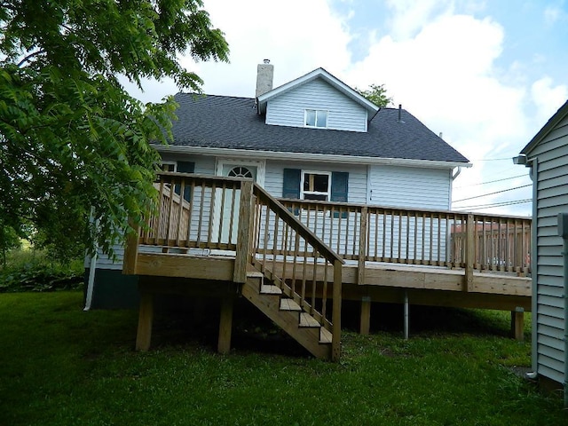 16 E Walnut St, Jeffersonville, OH 43128 - rear view of house featuring a deck, a chimney, roof with shingles, and stairs