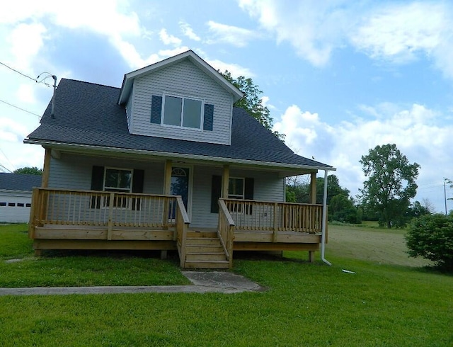 16 E Walnut St, Jeffersonville, OH 43128 - view of front facade with a front yard, a porch, and roof with shingles