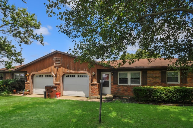 3847 Drew Rd, Arcanum, OH 45304 - ranch-style house with a garage, a front lawn, and brick siding