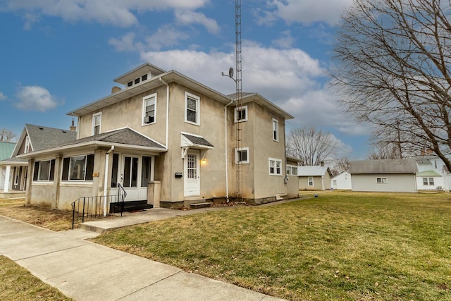 view of front of home featuring a front yard