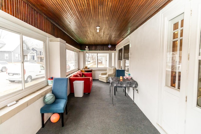 sunroom with wood ceiling