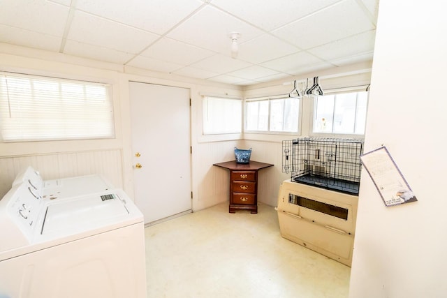 laundry room featuring washing machine and clothes dryer