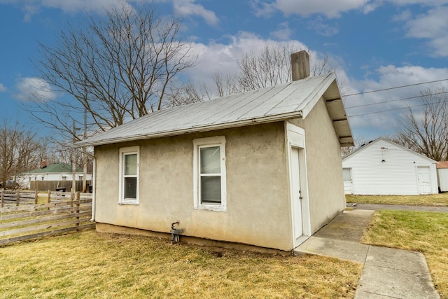 view of property exterior featuring a yard