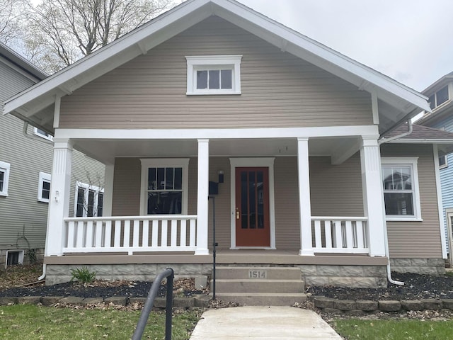 bungalow-style home featuring covered porch
