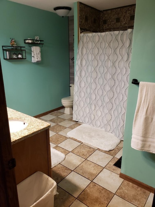 1607 Nagel St, Saint Marys, OH 45885 - full bathroom with baseboards, toilet, vanity, and curtained shower