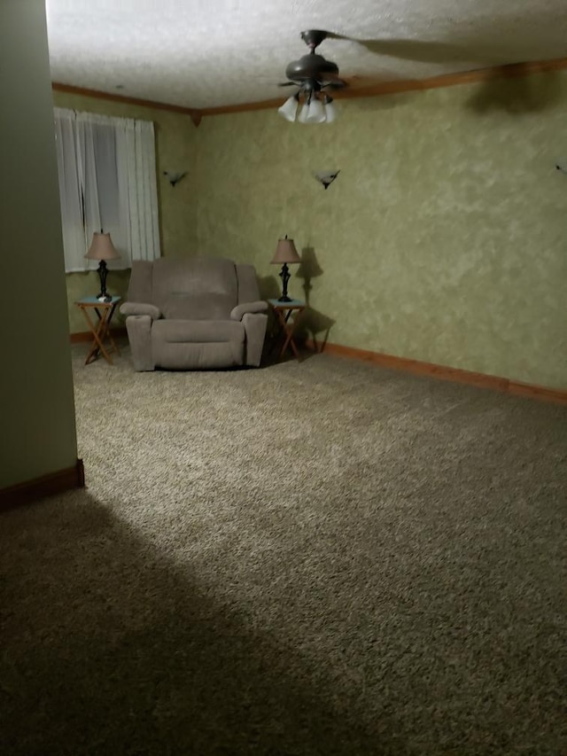 1607 Nagel St, Saint Marys, OH 45885 - unfurnished living room with baseboards, carpet floors, ornamental molding, and a ceiling fan