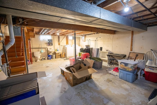 812 Motz St, Saint Marys, OH 45885 - unfinished below grade area featuring washer and dryer