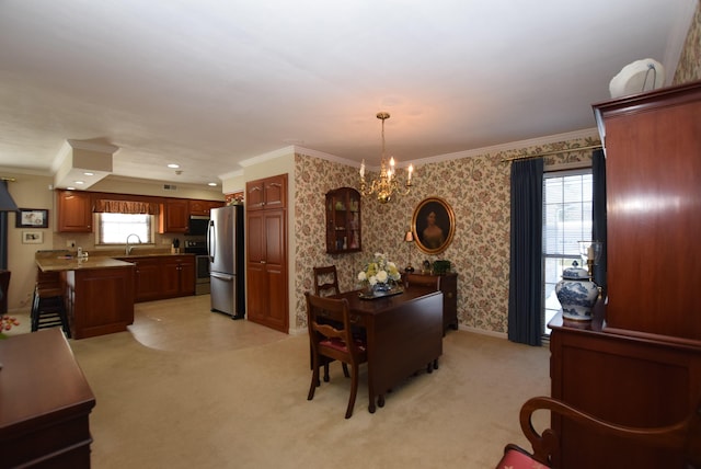 dining space with light carpet, a notable chandelier, crown molding, and a wealth of natural light