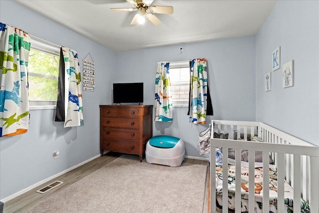 230 Morse St, Russells Point, OH 43348 - bedroom featuring multiple windows, baseboards, and ceiling fan