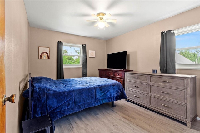 230 Morse St, Russells Point, OH 43348 - bedroom with light wood-type flooring and a ceiling fan