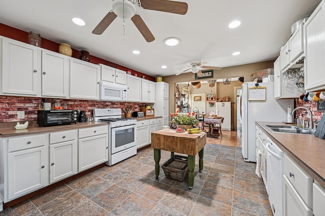 4711 N Elm Tree Rd, Conover, OH 45317 - kitchen featuring white appliances, a ceiling fan, white cabinetry, tasteful backsplash, and recessed lighting