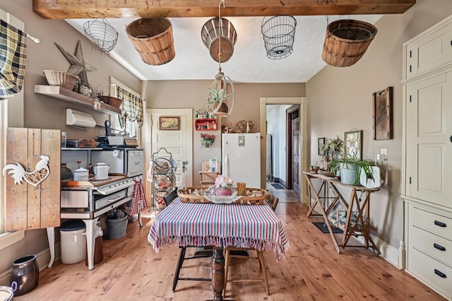 4711 N Elm Tree Rd, Conover, OH 45317 - dining space with light wood-style floors