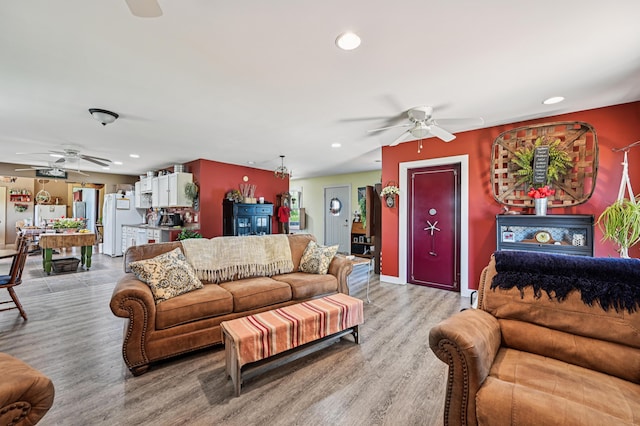4711 N Elm Tree Rd, Conover, OH 45317 - living area featuring a ceiling fan, recessed lighting, and light wood-type flooring