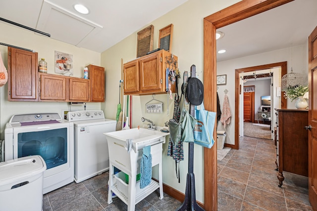 4711 N Elm Tree Rd, Conover, OH 45317 - laundry room featuring washer and dryer, cabinet space, dark stone finish flooring, and recessed lighting