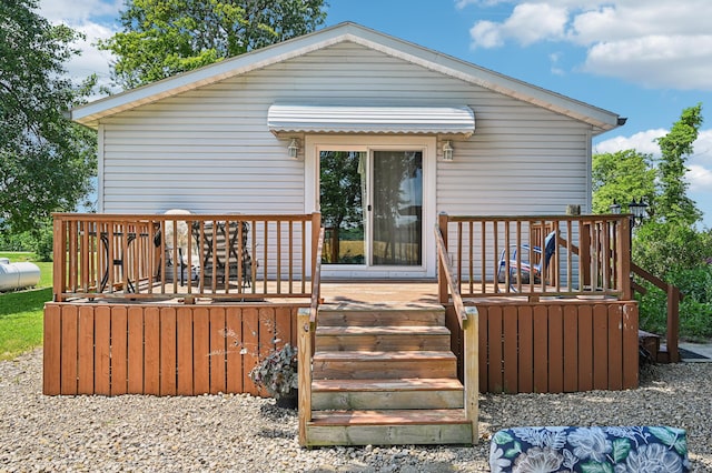 4711 N Elm Tree Rd, Conover, OH 45317 - rear view of house with a wooden deck
