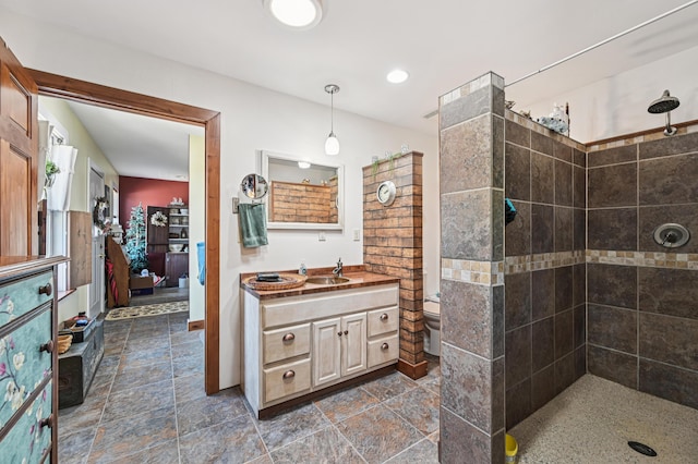 4711 N Elm Tree Rd, Conover, OH 45317 - ensuite bathroom with a tile shower and vanity