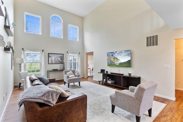 170 Fox Harbor Dr, Troy, OH 45373 - living area with wood finished floors and a high ceiling