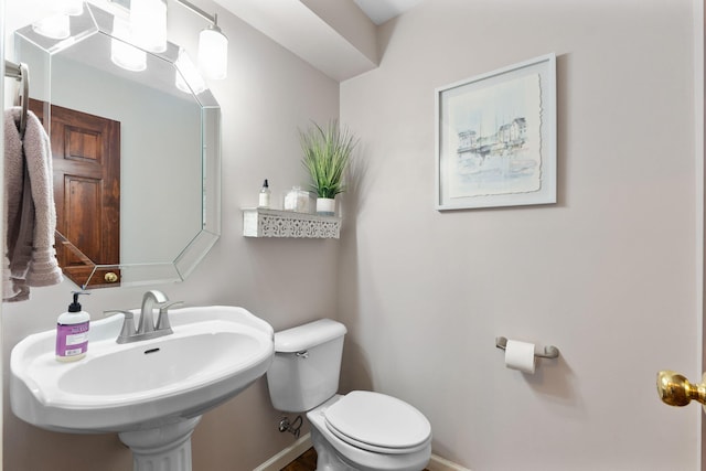 170 Fox Harbor Dr, Troy, OH 45373 - half bathroom with toilet and baseboards