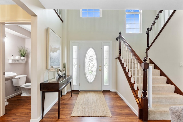 170 Fox Harbor Dr, Troy, OH 45373 - entrance foyer featuring wood finished floors, stairs, and a high ceiling
