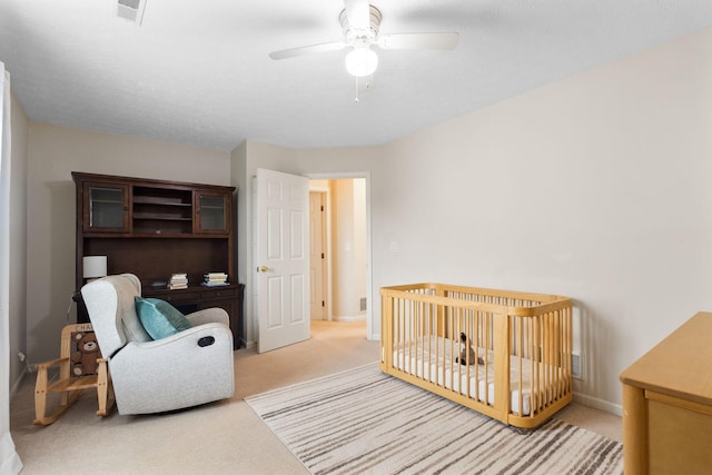 170 Fox Harbor Dr, Troy, OH 45373 - carpeted bedroom with baseboards and ceiling fan