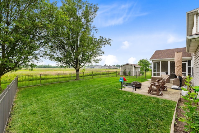 170 Fox Harbor Dr, Troy, OH 45373 - fenced backyard featuring a fire pit and a patio area