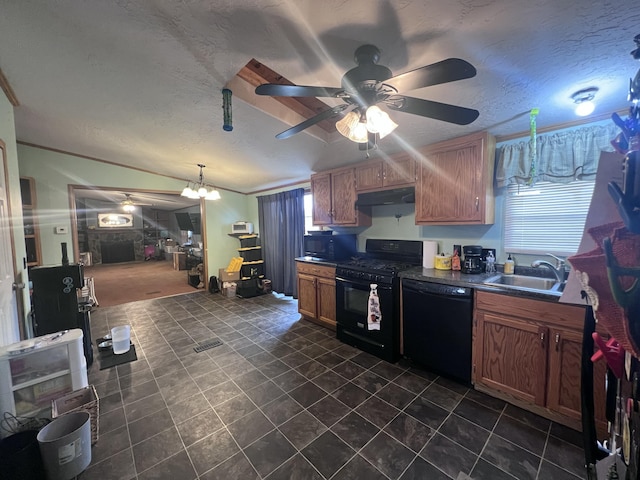 kitchen with a textured ceiling, black appliances, lofted ceiling, ceiling fan with notable chandelier, and sink