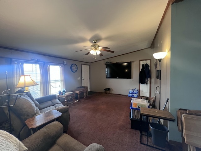 carpeted living room with ceiling fan and crown molding