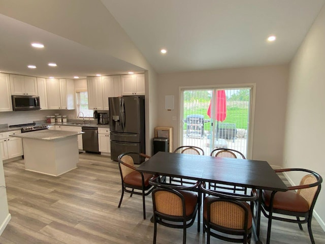 200 Malone Ave, Bellefontaine, OH 43311 - dining space with recessed lighting, light wood-style floors, lofted ceiling, and baseboards